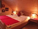 Vergrößern / Details: Rotes Schlafzimmer